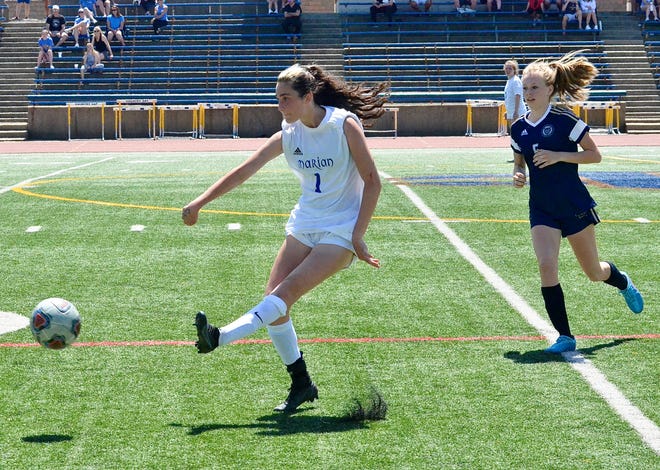 Bloomfield Hills Marian's Ange Briggs passes up the field during a non-conference girls soccer match on Saturday, May 14, 2022, at Detroit Country Day's Shaw Stadium.