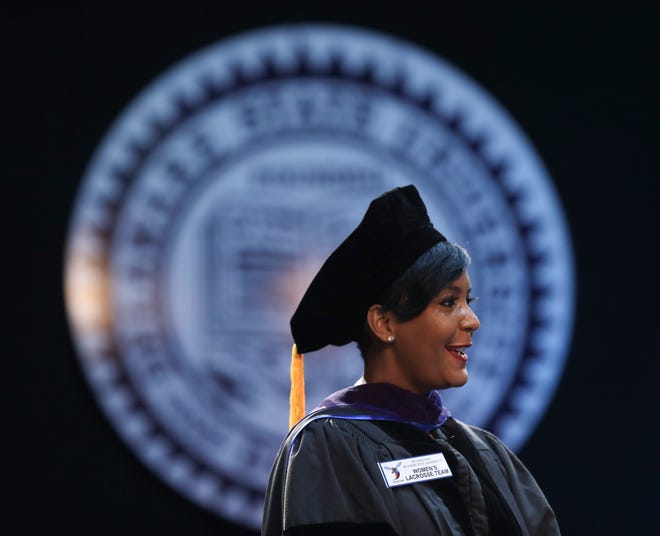 Former Atlanta Mayor Keisha Lance Bottoms prepares to deliver her address during Delaware State University's 2022 commencement ceremonies in Memorial Hall, Saturday, May 14, 2022. Bottoms focused her talk on the recent women's lacrosse team police stop, making comparisons to the civil rights era freedom riders and telling graduates that their experience might not be as extreme as that generation's but will still involve struggle for equality.