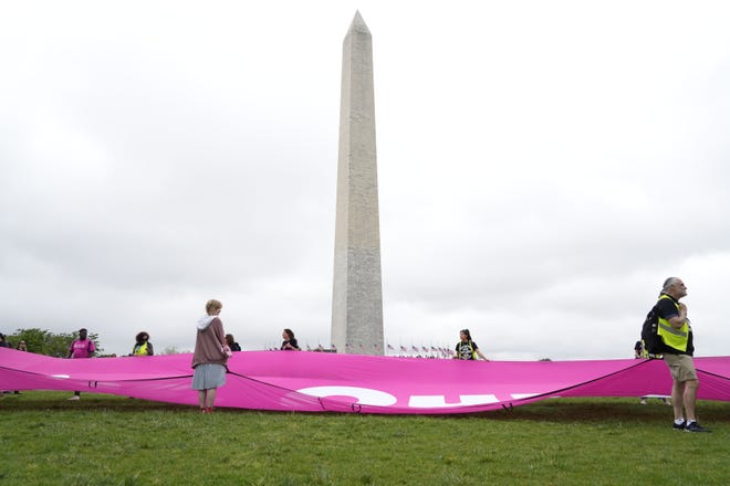 Protesters gather ahead of the 'Bans off your Bodies' abortion rights rally in Washington, DC on Saturday, May 14, 2022.