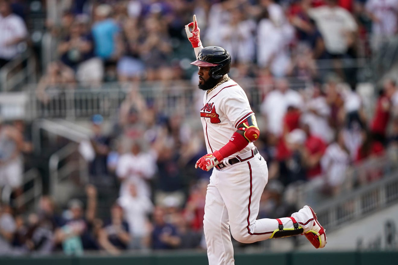 Atlanta Braves' Marcell Ozuna (20) celebrates after hitting a two-run home run in the eighth inning of a baseball game against the San Diego Padres, Saturday, May 14, 2022, in Atlanta.