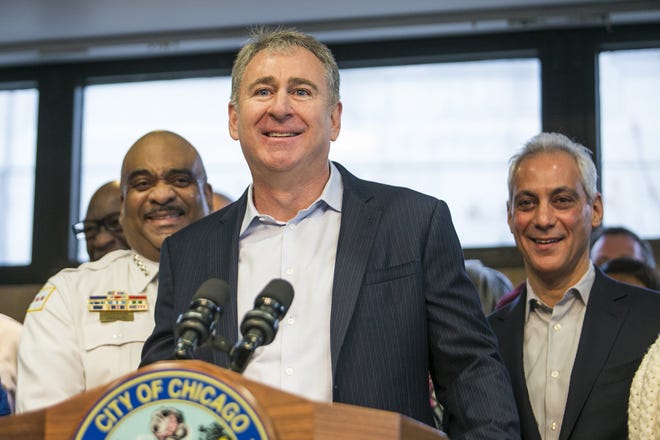 Chicago Police Supt. Eddie Johnson, left, and Mayor Rahm Emanuel, right, look on as Chicago billionaire Ken Griffin discusses a $10 million donation to reduce gun violence in the city during an April 2018 press conference in Chicago. Griffin gave $5 million to Gov. Ron DeSantis’ reelection bid.
