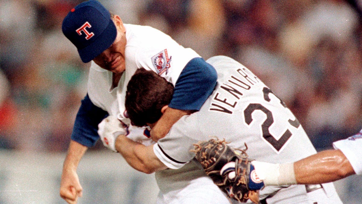 Nolan Ryan lands punches on Robin Ventura during a benches-clearing brawl on Aug. 4, 1993.