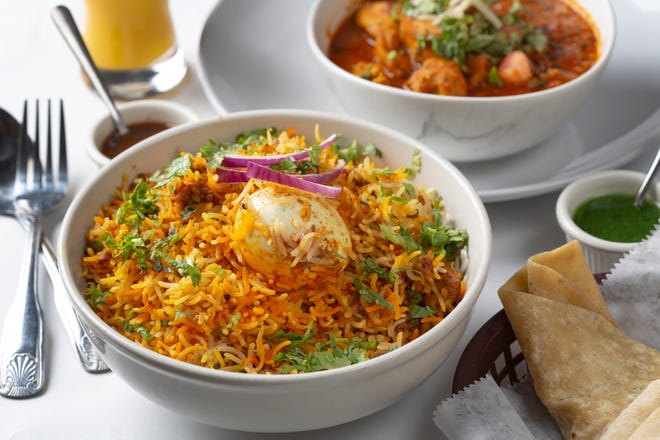 Lamb Biryani along with Rahra Style Chicken with Roomali Roti at Awadh India Restaurant on Bethel Road. (Photo by Tim Johnson)