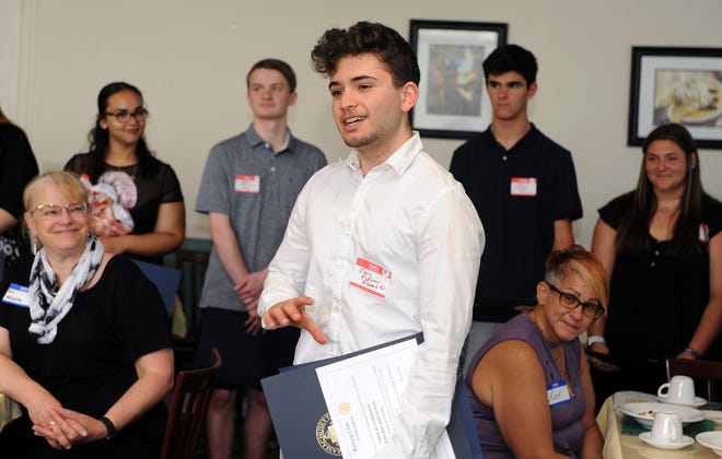 Ashland High School senior Faris Fakhouri speaks during the Rotary Club of Framingham Scholarship Presentation Luncheon at the East Side Room Keefe Tech Restaurant, May 16, 2022.