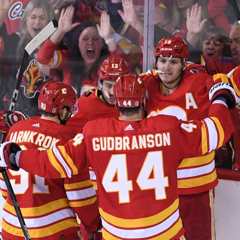 The Calgary Flames' Matthew Tkachuk celebrates his