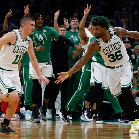 The Celtics' Marcus Smart (36) and Payton Pritchar
