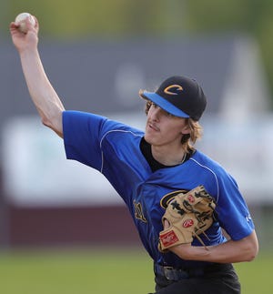 Coventry starter Brayden Clark pitches during a 9-3 Division II sectional semifinal baseball win over Woodridge on Monday. [Jeff Lange/Beacon Journal]