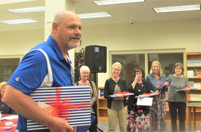 Retiring West Holmes Middle School Assistant Principal Ron Hay (from left), Julia Proper, Tracy McDowell, Patty Masters, Kaye Parsons  and Jody Gibbs shared plans for their retirement as well as some of their history in the West Holmes District during the recognition of retirees at the West Holmes School Board meeting Monday at West Holmes High School.