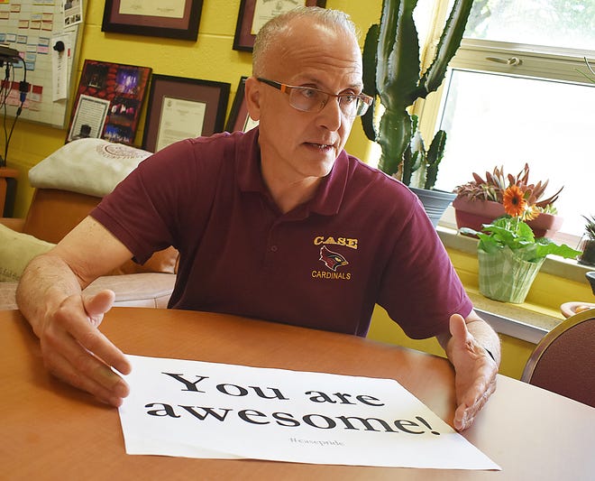Case High Principal Brian McCann helped launch an international social media trend with #positivesignthursday.
