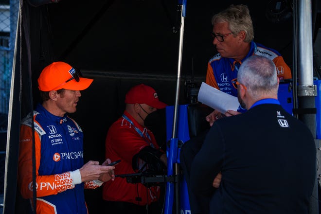 Chip Ganassi Racing driver Scott Dixon (9) talks to team members Tuesday, May 17, 2022, before the first practice session for the 106th Indianapolis 500 at Indianapolis Motor Speedway.