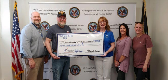 On May 10, the Veterans’ Committee from Penn Yan Elks Lodge 1722 presented a check for $719.96 to the Canandaigua Veterans Affairs Medical Center in support of its 2022 National Veterans Golden Age Games team.  The money will be used to purchase air rifles/pistols for veterans who will compete in NVGAG events inJuly in Sioux Falls, South Dakota.  Pictured in the photo are Hank Riegel, recreation therapy supervisor; Diz and Sheila Disbrow, Lodge 1722 Veterans’ Committee; Robin Johnson, manager of the Center for Development and Civic Engagement; and Kristie Nothnagle, recreation therapist.