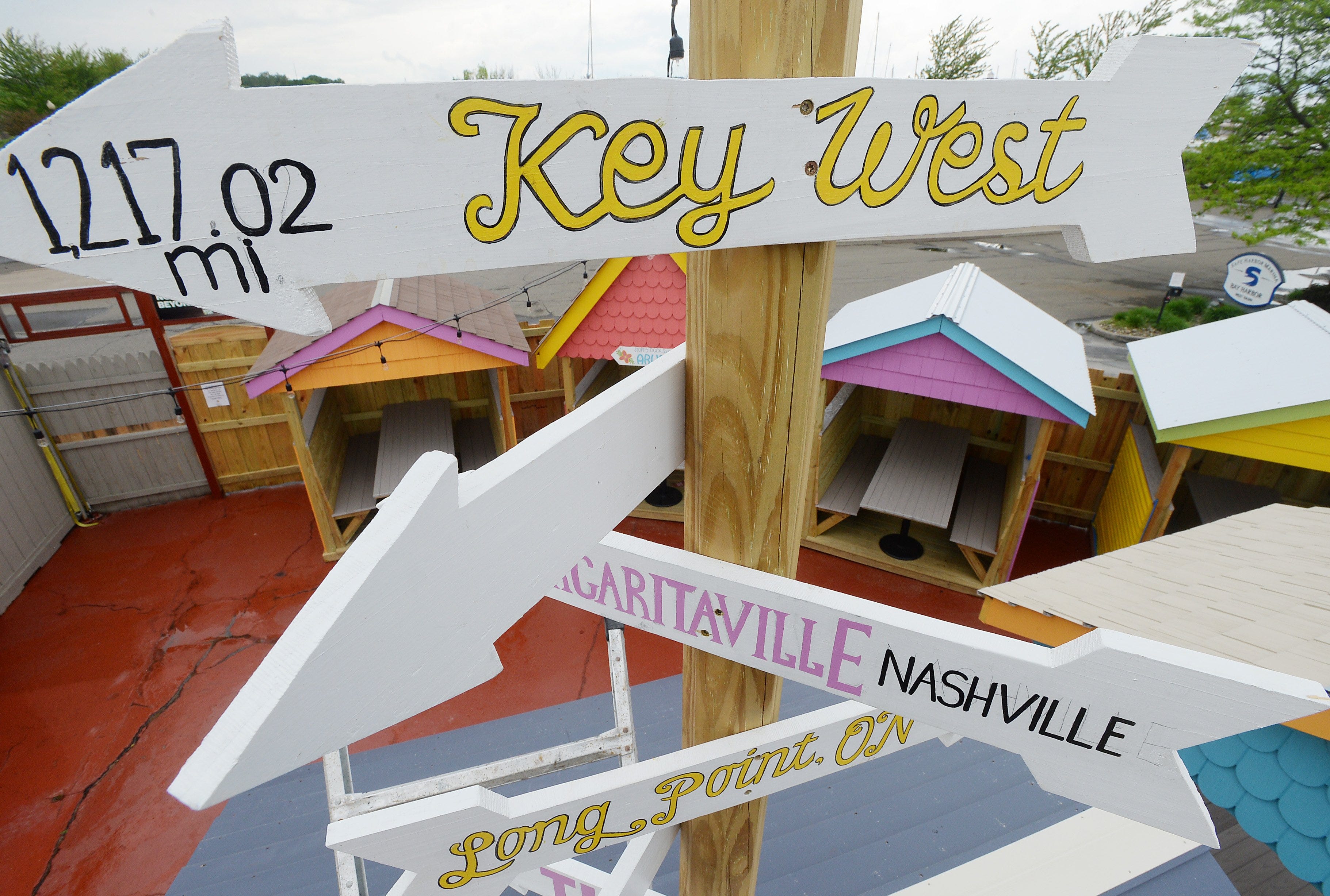 Signs at the Sloppy Duck Saloon, 726 W. Bayfront Parkway, adorn the Tiki Village thta opened in 2020 due to the COVID-19 coronavirus pandemic.