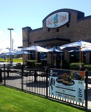 Ugly Tuna Tavern offers patio seating just a hop up the hill from the peninsula.