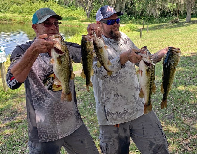 Kevin Blevins, left, and Charles Walker had 13.59 pounds and big bass with a 4.38 pounder to win the Freedom Bass Anglers tournament May 14 at Lake Juliana. 