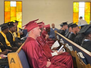 Polk Correctional Institution hosted a joint graduation ceremony on May 13 for inmates completing their high school diploma, heavy equipment operations certification and Polk State College Essentials of Manufacturing and Logistics.
