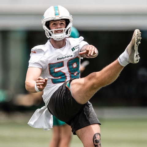 Dolphins punter Tommy Heatherly works out in Miami