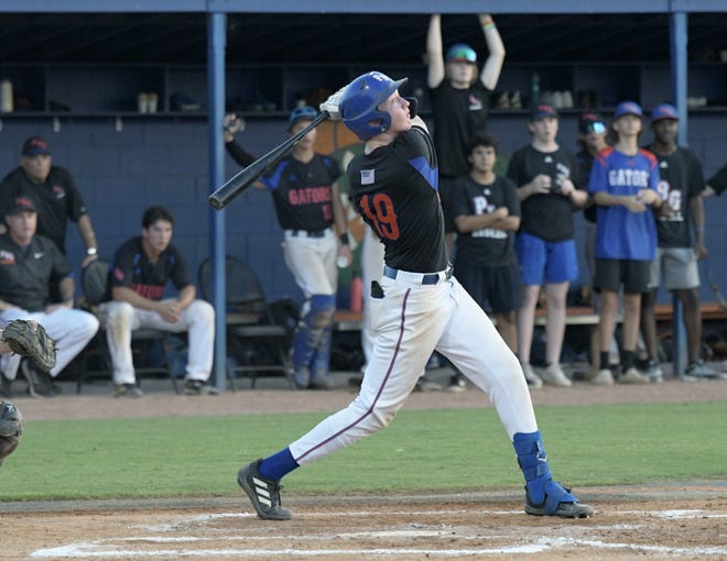 Palm Beach Gardens' Enzo Vertucci takes a powerful swing during Tuesday's regional finals victory over Park Vista. Vertucci notched the game-winning double in the bottom of the sixth to send the Gators to the state championship on May 17, 2022.