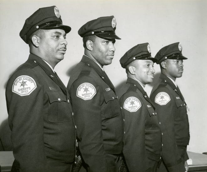 William Hughes, second from right, in Shelby County Sheriff's Office deputy uniform on March 1961. Hughes, 90, died May 15, 2022.