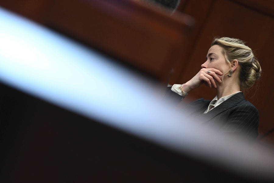 US actress Amber Heard looks on in the courtroom at the Fairfax County Circuit Courthouse in Fairfax, Virginia, on May 17, 2022.