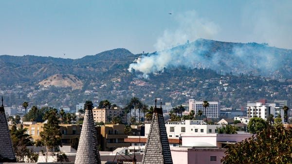 A brush fire erupted near Griffith Observatory in 