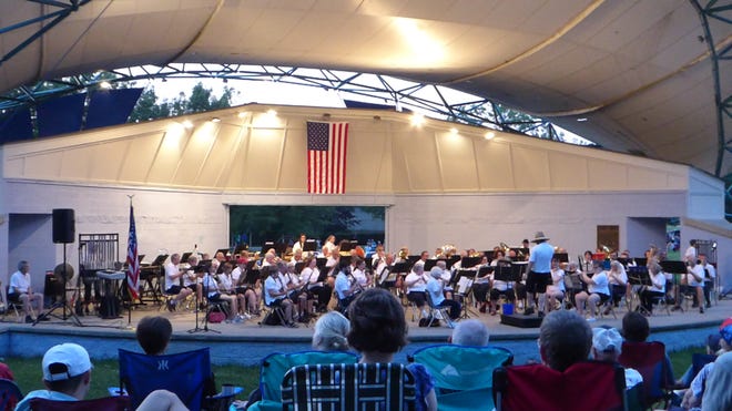 A twilight view of the Oak Ridge Community Band in concert last summer. The Band will perform its annual Memorial Day Concert next Monday.