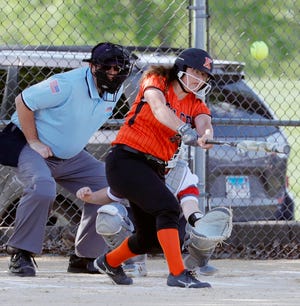 MacKensey Stontz led the assault on Hall in the first round of regional play Monday, smacking a homer here as the Boiler girls won 18-0.