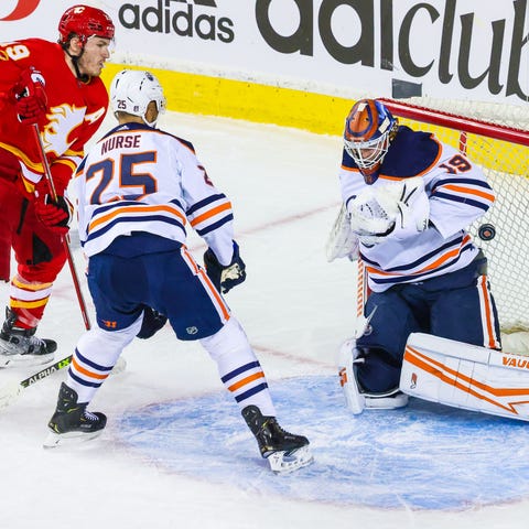 Calgary Flames left wing Matthew Tkachuk scores ag