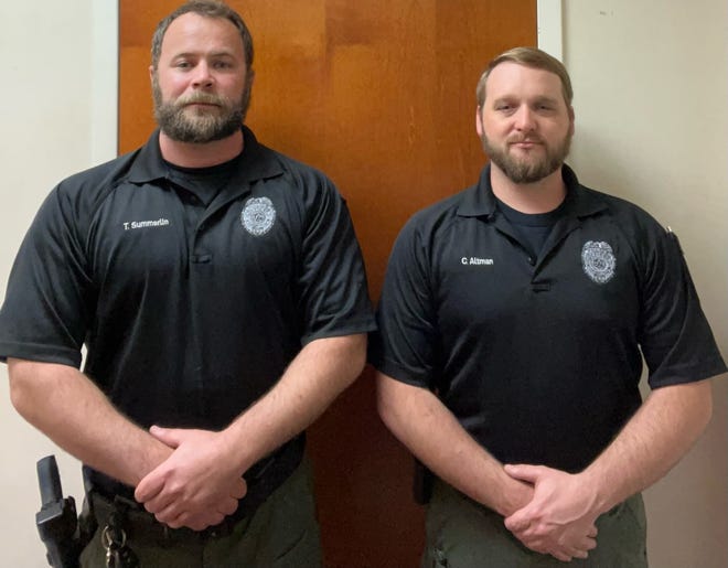 From left are Corporal Tom Summerlin and Patrolman Cody Altman, Hampton Police Department.