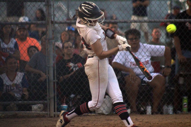 Baldwin's Piper Young hits the go-ahead home run in the fourth inning against Keystone Heights in Thursday's Region 1-3A softball final.