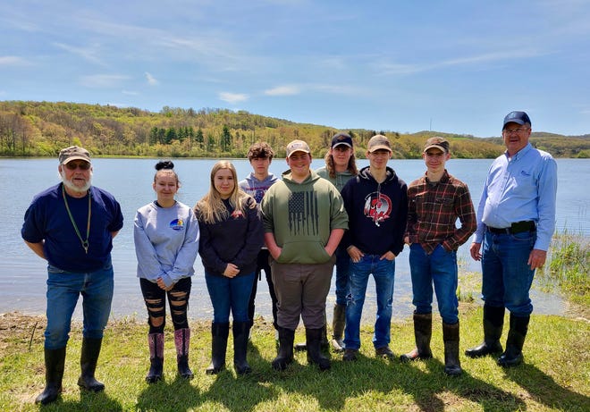 Students at Meyersdale Area High School recently completed a special project in conjunction with the PA Fish and Boat Commission and the Salisbury-Elk Lick Hunting Club. Students received delivery of channel catfish in October and have been responsible for their care through May. On May 10, students helped release more than 150 catfish into Donegal Lake. The following students are seen with Mike Fike (far left) and Don Anderson (far right) from the Salisbury-Elk Lick Hunting Club: Sage Logsdon, Maddie Engle, Lars Murray, Brayden VanBogelen, Nick Fleissner, Tyler Holbrook and Jesse Miller.