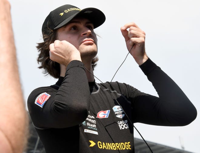 Andretti Autosport with Curb-Agajanian driver Colton Herta (26) puts in his hearing protection Friday, May 20, 2022, during Fast Friday practice in preparation for the 106th running of the Indianapolis 500 at Indianapolis Motor Speedway