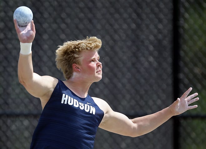 Hudson's Blake Toth competes in the boys shot put during the Division I district track meet at Nordonia High School on Friday.