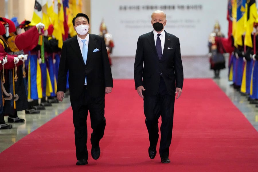 U.S. President Joe Biden and South Korean President Yoon Suk-yeol arrive at the National Museum of Korea for the state dinner on May 21, 2022 in Seoul, South Korea.