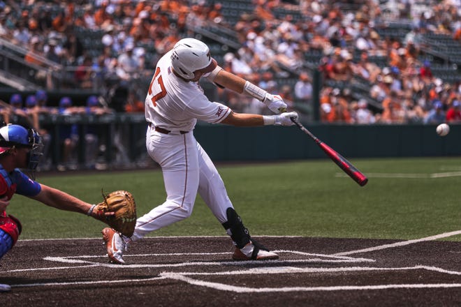 Texas infielder Ivan Melendez (17) swings at a pitch during the game against Kansas at Disch-Falk Field in Austin, Texas on May 21, 2022.