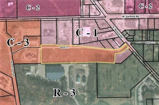 The orange shaded property in the center of this map, south of Maple Lane Extension, is where rezoning from C-3 commercial to R-S residential senior housing was sought.