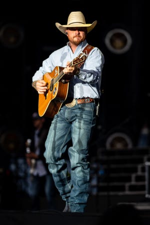 Cody Johnson opens for Luke Combs at Empower Field at Mile High in Denver, Colorado on Saturday, May 21, 2022. The show kicked off Combs' first-ever headlining stadium tour.