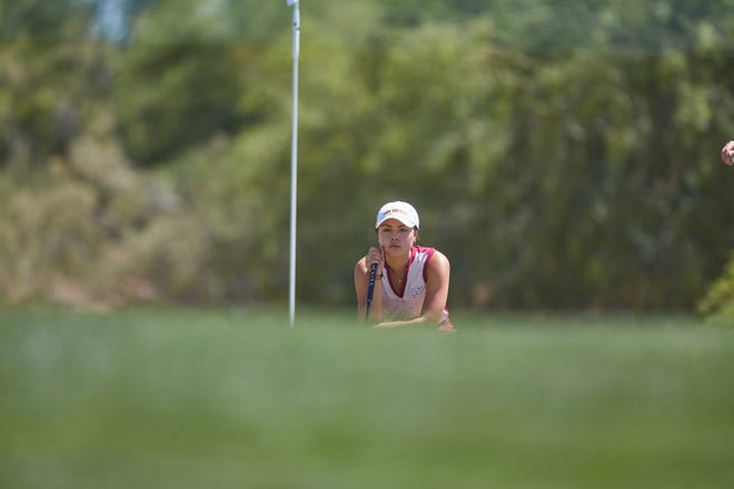 May 21, 2022; Scottsdale, Arizona, USA; ASU golfer Ashley Menne lines up a shot on the 11th hole during the second round of the NCAA Division 1 Championship at Grayhawk Golf Club.