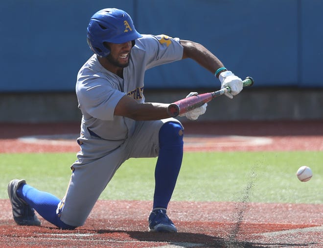 Angelo State University's Koby Kelton lays down a bunt against Texas A&M-Kingsville during the final game of the South Central Regional Section I Tournament at Foster Field at 1st Community Credit Union Stadium on Saturday, May 21, 2022.