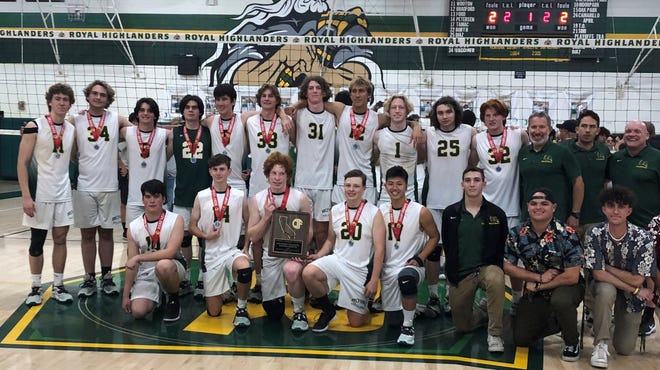 The Royal boys volleyball team poses with the runner-up plaque and medals after falling to Upland in five sets in the CIF State SoCal Division 2 Regional championship match Saturday night.