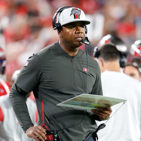 Tampa Bay Buccaneers offensive coordinator Byron Leftwich looks on against the New Orleans Saints at Raymond James Stadium in 2021.