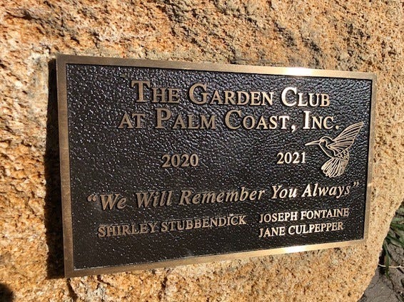 One of the memorial plaques installed by the Garden Club at Palm Coast.