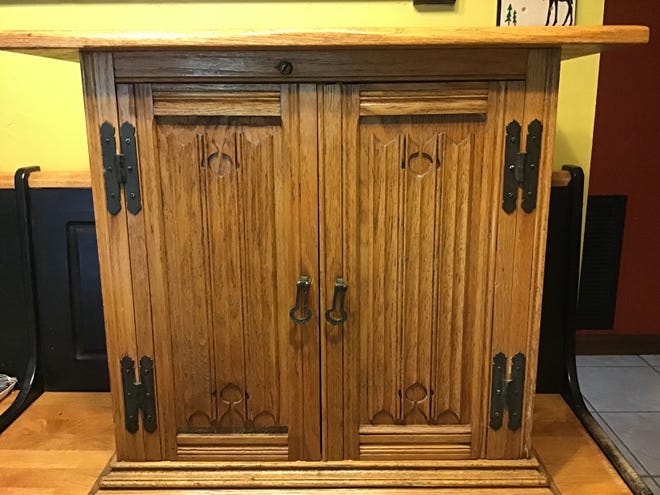 This attractive cabinet is of no specific collector interest and is in the used-furniture category, which is why it was found it at the thrift store.