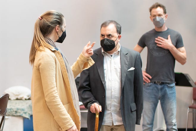 Director Annika Boras, left, talks with actors Steven Rattazzi and Jonathan Wainwright during an early rehearsal for "Murder on the Orient Express."