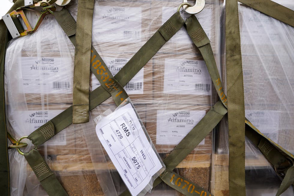 Some of the 132 pallets of Nestlé Health Science Alfamino Infant and Alfamino Junior formula are seen after being unloaded from an Air Force C-17 plane at the Indianapolis International Airport in Indianapolis, May 22, 2022.