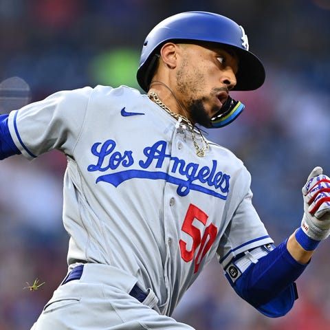 Dodgers outfielder Mookie Betts rounds first base 