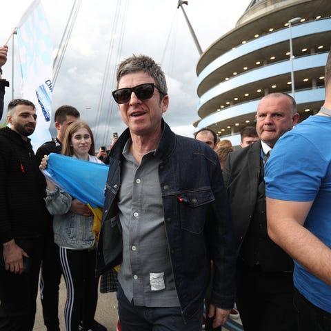 Noel Gallagher leaves the stadium after Manchester