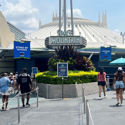Space Mountain typically requires waiting in stand