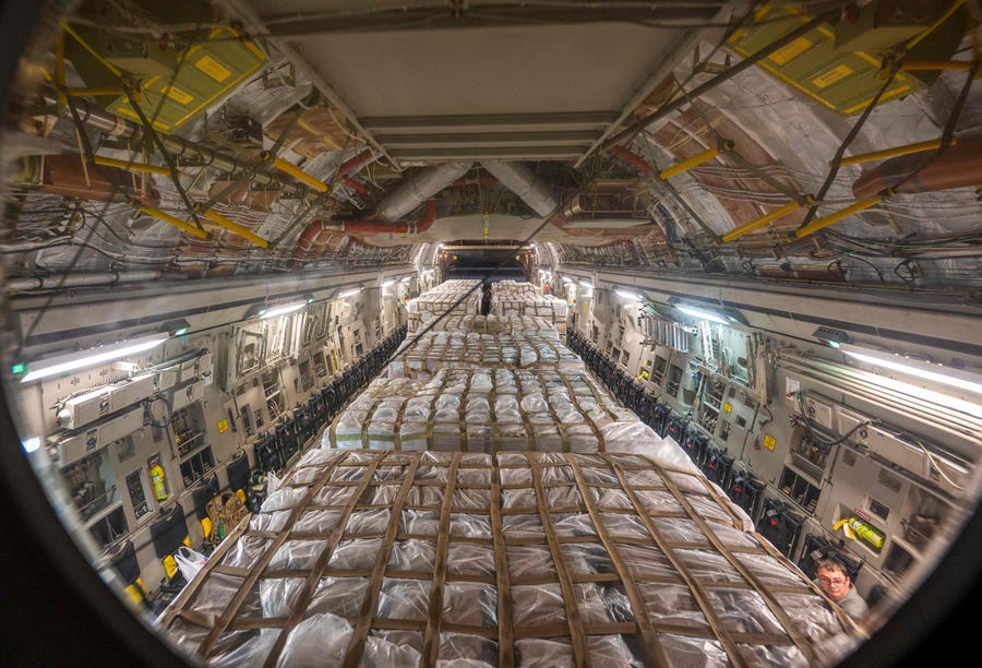 In this handout photo taken and provided by the US Air Force on May 22, 2022, a C-17 Globemaster III assigned to Joint Base Pearl Harbor-Hickam, Hawaii, carries pallets of infant formula at Ramstein Air Base, Germany.