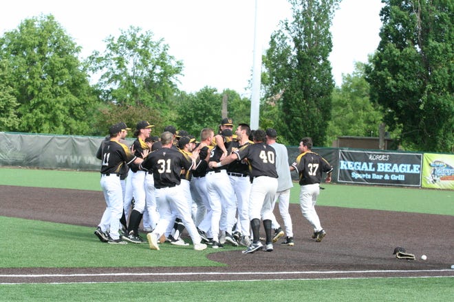 The College of Wooster celebrates its improbable regional title after beating Bethel twice in elimination games Monday.