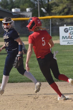 Orion’s Avah Jones is safe at second on Hannah Swope’s single in the top of the third inning during first-round regional action with Mercer County on Monday, May 16, at Apollo Elementary School, Aledo.
